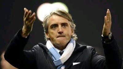 Roberto Mancini believes Manchester City 'will be a top club for many years' as they prepare to face Manchester United tonight. Paul Ellis / AFP
