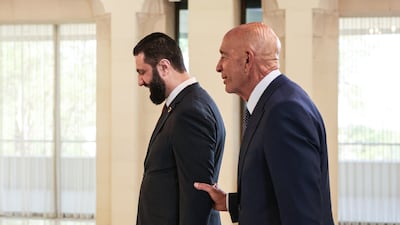 Syrian President Ahmad Al Shara receives US special envoy Thomas Barrack, right, in Damascus on Wednesday. EPA