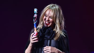 Australian singer Kylie Minogue received the Brit's Golden Icon award. AFP
