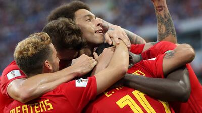Belgium players celebrate Romelu Lukaku's second goal. Friedemann Vogel / EPA