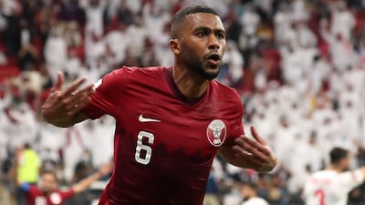 Abdulaziz Hatem celebrates scoring Qatar's winning goal against Bahrain on the opening day of the Fifa Arab Cup on Tuesday, November 30. Reuters