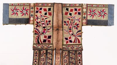 Festival coat Miao, south-west China, late 20th century The Miao people come together every 13 years to dance, eat, drink and honour their ancestors. Coats and aprons richly embroidered with birds and insects, as well as elaborate silver jewellery, are worn for these Guzhang festivals and for the celebration of New Year. © the Trustees of the British Museum