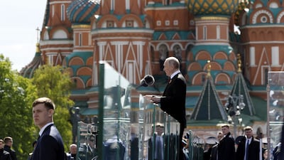 Mr Putin delivers his speech in Red Square. AP