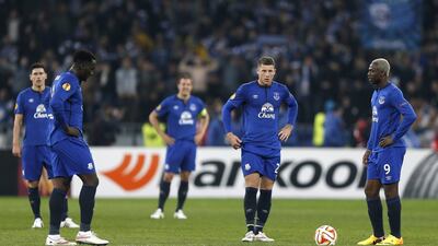 Everton players shown after Dynamo Kiev scored their fifth goal on Thursday night to defeat the Premier League club in the Europa League. Peter Cziborra / Reuters / March 19, 2015