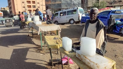 Selling ice blocks on the street amid rising temperatures during Ramadan, in Gedaref, eastern Sudan. AFP