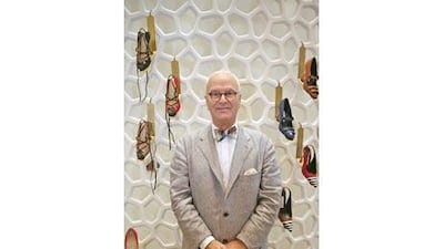 The designer Manolo Blahnik at his boutique in Dubai Mall.