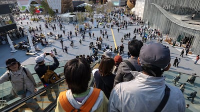 Visitors ride the escalator to the main arena at Expo 2025 Osaka-Kansai in Japan. Victor Besa / The National