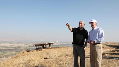 (FILES) In this file photo taken on June 23, 2019 Netanyahu and then-US National Security Advisor John Bolton, right visit an old army outpost overlooking the Jordan Valley. AFP