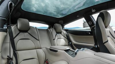 The Lusso’s interior is a triumph of design and packaging, with just the right amount of drama (those air vents look incredible) and cushioning luxury. Courtesy Ferrari