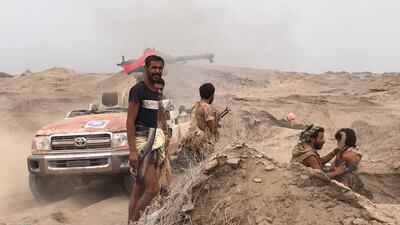 Yemeni pro-government forces man a barricade in the area of Al Fazah in Yemen's Hodeidah province on June 16, 2018. AFP