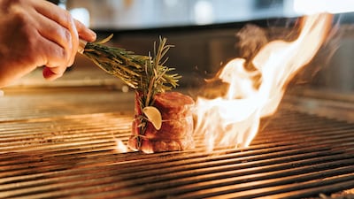 Aromatic steak being cooked at The Grill, Marriott Hotel Al Forsan