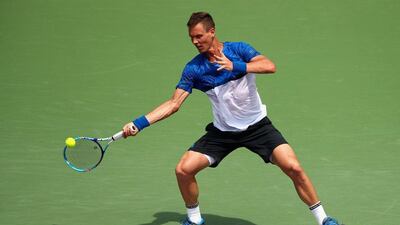 Tomas Berdych of the Czech Republic plays a forehand against Steve Johnson of the United States in their third round match during the Miami Open Presented by Itau at Crandon Park Tennis Center on March 27, 2016 in Key Biscayne, Florida. Clive Brunskill/Getty Images/AFP