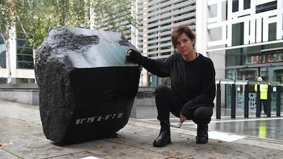 Artist Fiona Banner delivers her granite sculpture, ‘Klang’, in front of the UK's Department for Environment, Food and Rural Affairs. Chris J Ratcliffe / Greenpeace