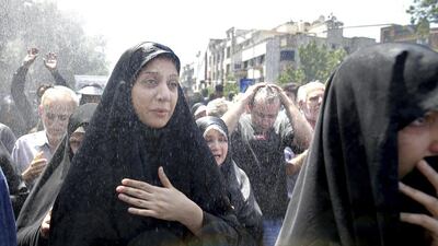 Iranians attend the funeral on June 9, 2017 of victims of an ISIL militant twin attacks on in Tehran, Iran which killed 17 people in Tehran this week. Ebrahim Noroozi/AP Photo