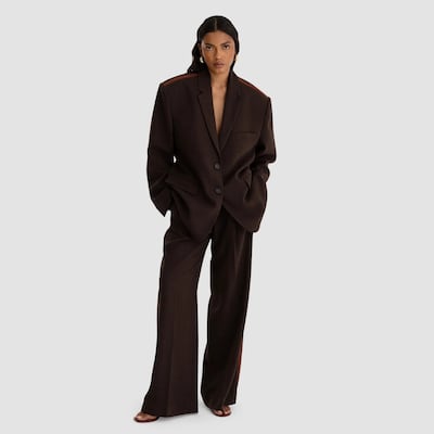 Strong shoulders, jackets and wide-leg trousers bring a sharper silhouette to winter dressing. Photo: Bougessa