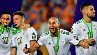Adam Ounas, Ismail Bennacer, Adlene Guedioura and Andy Delort are jubilant after Algeria's historic success. AFP