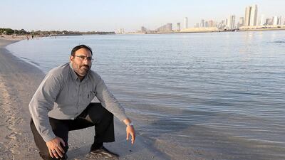 Dr Abu Baker Al Hakim , a Sudanese PhD graduate in water resources from UAE University at Al Mamzar beach in Dubai. Pawan Singh / The National