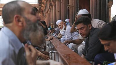 Indian Muslims perform ablution before prayers on the first Friday of the holy fasting month of Ramadan at Jama Masjid in New Delhi, India. Altaf Qadri / AP Photo