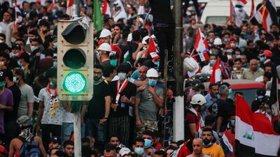 Demonstrators take part in a protest in Baghdad. Reuters