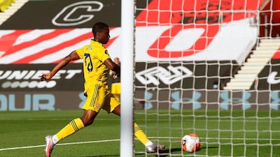 Arsenal's Eddie Nketiah scores the opening goal at St Mary's. EPA