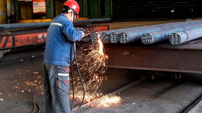 A worker cuts steel at a factory in Zouping in China's eastern Shandong. President Donald Trump is already threatening additional rounds of tariffs, possibly targeting more than $500bn worth of Chinese goodsA trade war between the US and China, the two biggest economies, could hurt global growth as both countries seek to slap protectionist tariffs that would will dampen trade. AFP