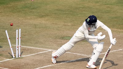 India's KS Bharat is bowled by Nathan Lyon of Australia for three. Getty