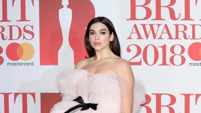 Dua Lipa, in Giambattista Valli, attends the Brit Awards at The O2 Arena on February 21, 2018 in London, England. Getty