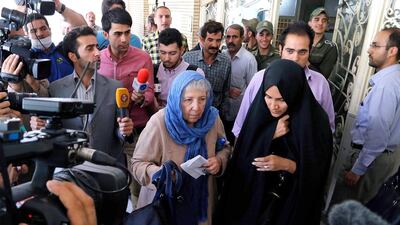 Mary Rezaian (C-L), mother of detained Washington Post correspondent Jason Rezaian, and Rezaian's wife Yeganeh Salehi (C-R) leave the court after a hearing in Rezaian's trial at the Revolutionary Court in Tehran on August 10. EPA