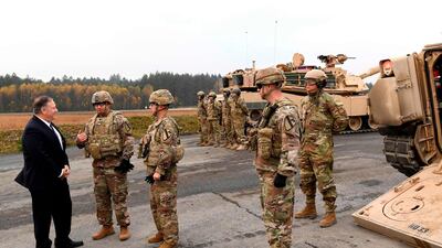 US Secretary of State Mike Pompeo talks to US soldiers as he visits the military basis in Grafenwoehr, Germany. America's top diplomat is on a two-day tour of Germany ahead of the 30th anniversary of the fall of the Berlin Wall. AFP