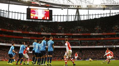 Arsenal’s Alexis Sanchez shoots to score from a free-kick during their Premier League win over Stoke City. Eddie Keogh / Reuters