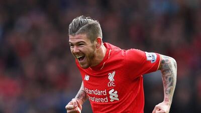 Alberto Moreno of Liverpool (18) celebrates as he scores their first goal during the Premier League match between Liverpool and Stoke City at Anfield on April 10, 2016 in Liverpool, England. (Photo by Clive Brunskill/Getty Images)