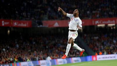 England's Raheem Sterling celebrates scoring their first goal against Spain. Action Images via Reuters