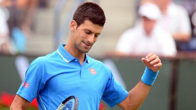 Novak Djokovic reacts during his ATP Indian Wells Masters final victory over Roger Federer on Sunday in California. Frederic J Brown / AFP / March 22, 2015