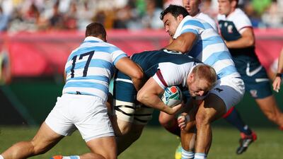 Ben Landry of the United States is tackled by Mayco Vivas and Agustin Creevy of Argentina during the Rugby World Cup 2019 Group C game between Argentina and USA at Kumagaya Rugby Stadium in Kumagaya, Saitama, Japan. Getty Images