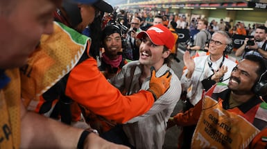 Benson Boone with marshals after the qualifying session before the Formula One Abu Dhabi Grand Prix at Yas Marina Circuit on Saturday. AFP