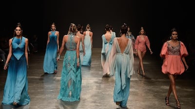 Models walk the runway at the Finale of the Dany Tabet show during Dubai Fashion Forward Spring/Summer 2016 at Madinat Jumeirah on October 23, 2015 in Dubai. Pascal Le Segretain / Getty Images for Fashion Forward