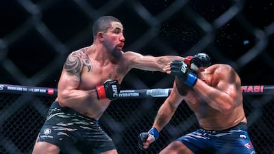 Robert Whittaker, left, suffered a split decision defeat to Reinier de Ridder