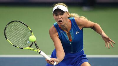Caroline Wozniacki of Denmark plays forehand in her match against Viktorija Golubic of Switzerland during Day 3 of the WTA Dubai Duty Free Tennis Championship at the Dubai Tennis Stadium on February 21, 2017 in Dubai, UAE. Tom Dulat / Getty Images