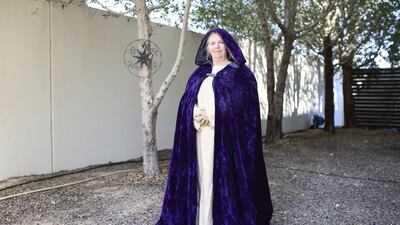 Dawn Donald, a new SCA member, is photographed in a Medieval European outfit in Abu Dhabi.