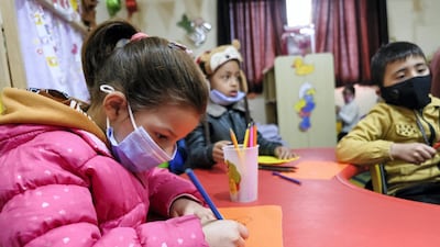Children on their first day back to kindergarten in Al Baqa’a camp, following Covid-19 school closures. Amy McConaghy/ The National