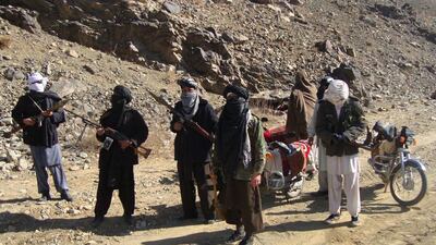 Taliban fighters on patrol in January 2010. AFP Photo