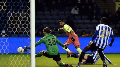 Joe Wildsmith saves from Manchester City's Riyad Mahrez. AP