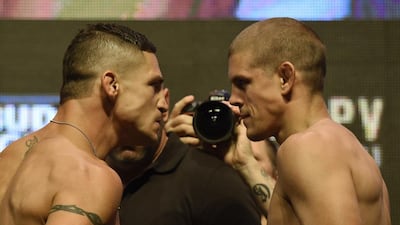 Mixed martial artists Diego Sanchez, left, and Joe Lauzon face off during their weigh-in for UFC 200 at T-Mobile Arena in Las Vegas. Ethan Miller / Getty Images / AFP