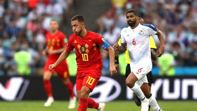 Eden Hazard of Belgium runs with the ball under pressure from Gabriel Gomez of Panama. Francois Nel / Getty Images