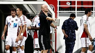 Nick Worth on the sidelines of an Al Jazira game.