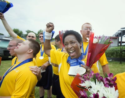 Loretta Claiborne, right, and teammates on Pennsylvania's Traditional 5V5 Division 3 Special Olympics soccer team in 2014. AP