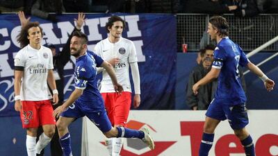 Bastia's Julien Palmieri, second left, celebrates after scoring against Paris Saint-Germain on Saturday in his side's 4-2 Ligue 1 victory. Pascal Pochard-Casablanca / AFP / January 10, 2015