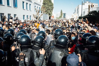 Hundreds of protesters pressed towards Tunisia's parliament building on Tuesday. Erin Clare Brown for The National