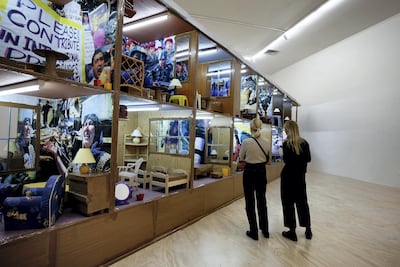 Thomas Hirschhorn's 'Hotel Democracy' (2003), a motel-like installation about the Iraq War, at MoMA PS1's 'Theater of Operations: The Gulf Wars 1991–2011'. Getty