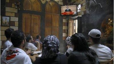 Despite the Assad regime's crackdown on Syrian protesters, many of them have retained their sense of humour. Muzaffar Salman / AP Photo